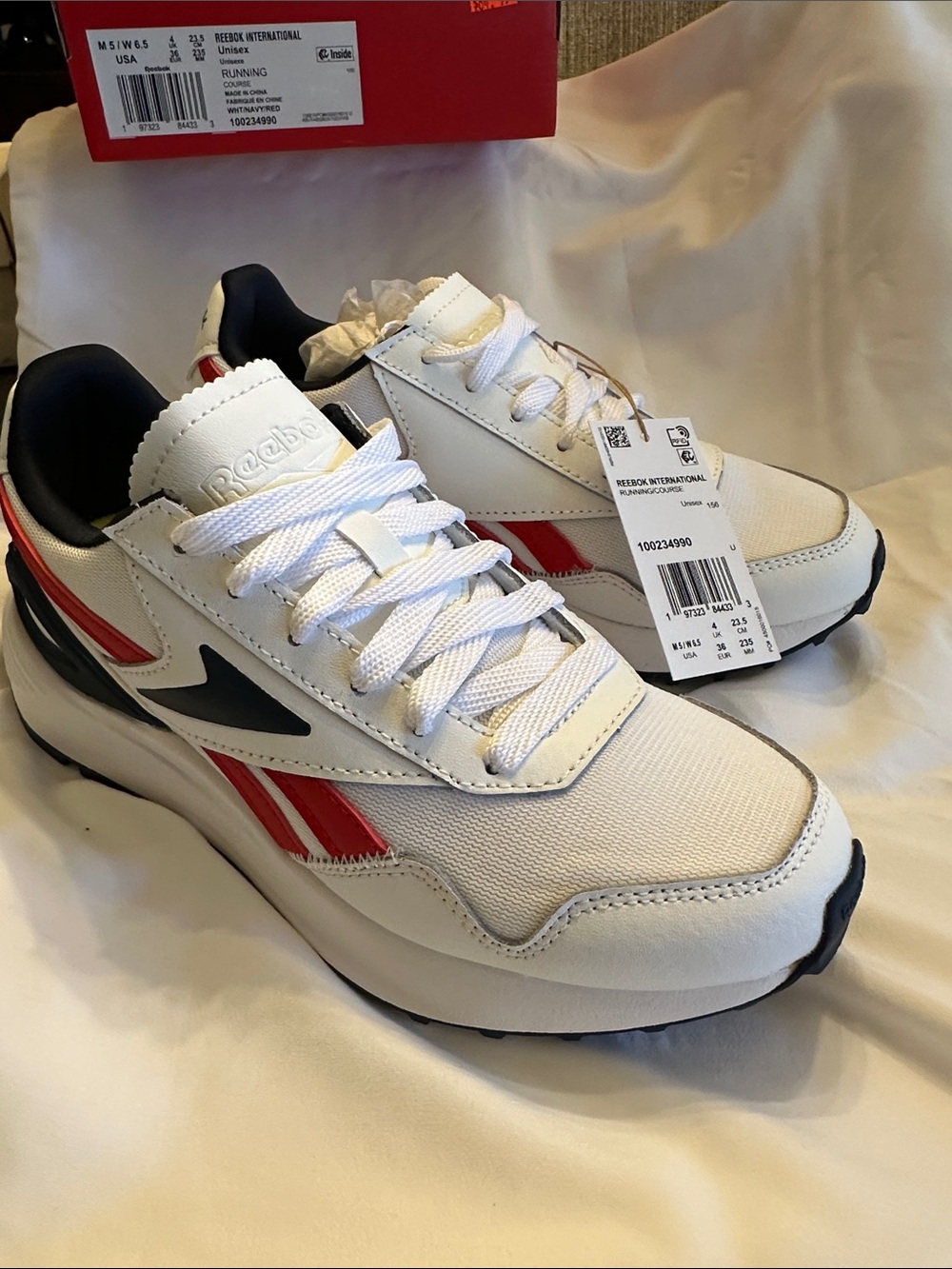 Perfect for the 4th of July!!  Reebok White Sneakers with Red & Navy Accents
